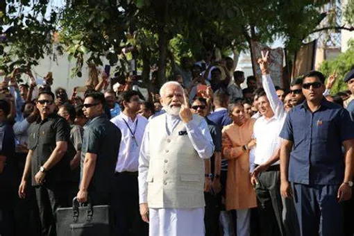 Prime Minister Modi Votes in Ahmedabad, Massive Crowd Congregate at Voting Booth