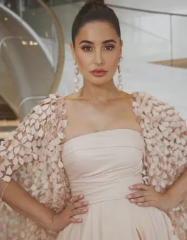 Nargis Fakhri made a stylish appearance in a strapless gown, her ensemble also featured an embellished cape.