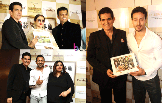 Omung Kumar Auctions Hand Painted Animal Calendar For Charity In Presence Of Rekha And Tiger Shroff