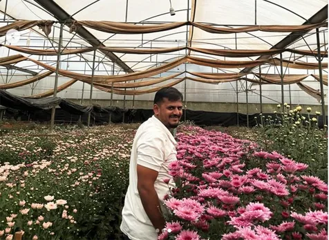 Lohith Reddy at his polyhouse in Kommasandra, Bengaluru