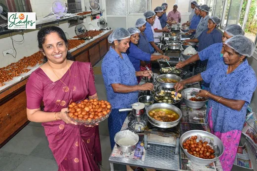 Jasmine, who has lost her vision, is at her Appoos Food production centre with her workers