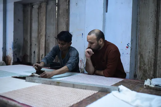 Mohit Ahluwalia with a hand block printing artisan