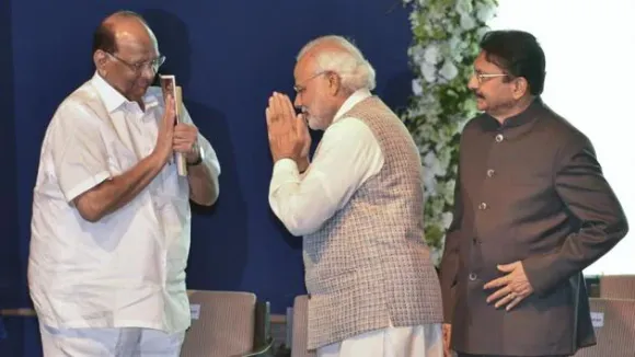 Breaking: Sharad Pawar shakes hands with Modi
