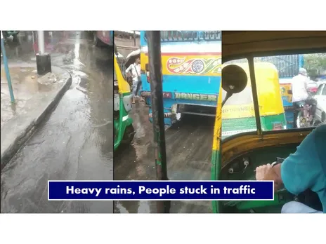 Heavy rains, People stuck in traffic
