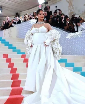 Baby bump spotted in white gown, Rihanna flaunts at Met Gala