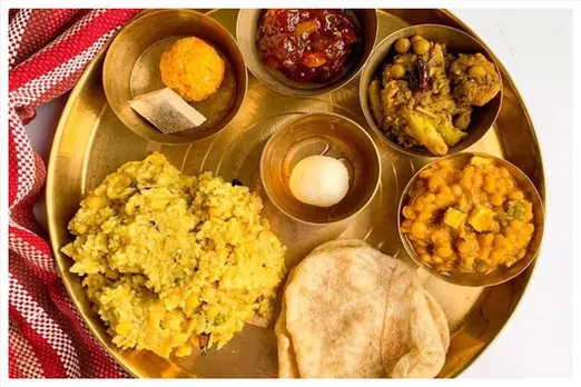 A special attraction of Durga Puja is the khichuri bhog on Mahashtami