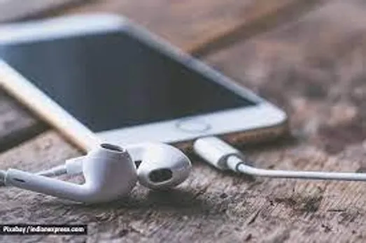 What are the complications that can arise due to constant unavoidable usage of earphones?