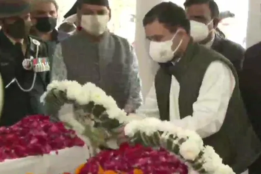 Rahul Gandhi pays last respects to Rawat couple