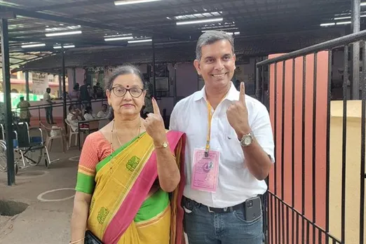 Amit Palekar casts his vote with his mother