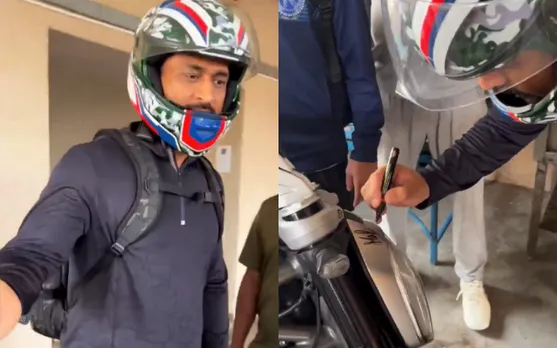 Watch: MS Dhoni Giving Autograph on a fan's Ducati Bike is the best thing on the internet!