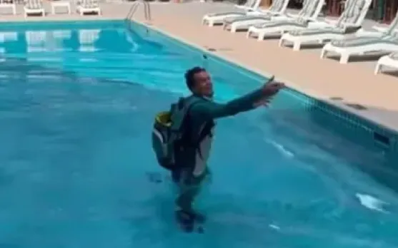Watch: Alex Carey walks straight into the pool in a hilarious video