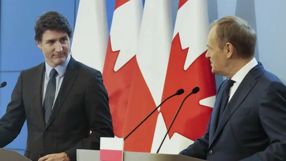 Trudeau and Tusk Call for Increased NATO Support to Ukraine Amidst Conflict