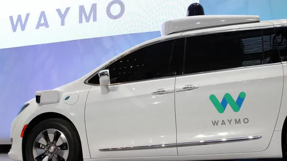Waymo teams up with Lyft to work on self-driving cars