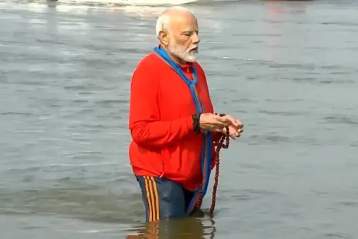 PM Modi Taking Holy Dip at Sagam