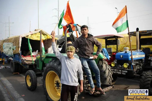 Agitating farmers gear up for summer months with mosquito nets, repellent, fans