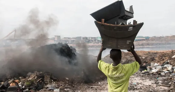 At least 18 million children work in 'digital garbage dumps'