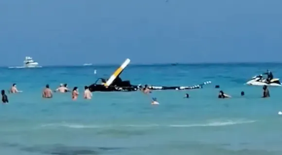 Dramatic video of Miami beach helicopter crash, 2 Injured
