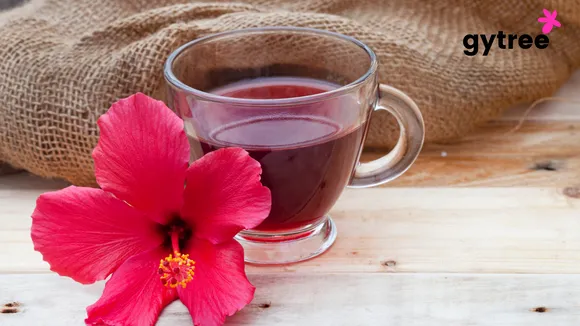 How can Hibiscus flowers nurture hair growth?