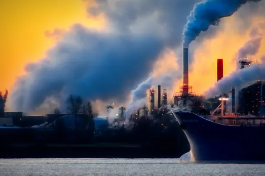 black ship on body of water screenshot. Air pollution