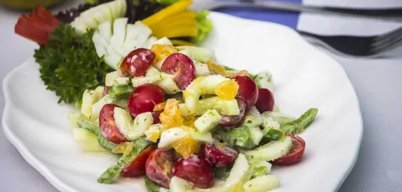 Orange & cucumber salad with honey hung curd dip at The Ashok