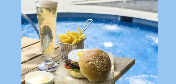 Cool off this summer at the BEER & BURGER festival at Conrad Pune