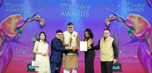 Minister of State for Tourism & Culture, Prahlad Singh Patel, gives an award to Cygnett Hotels and Resorts for being the 'Fastest Growing Hotel Chain'