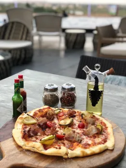 Jazz up your evening with the perfect pairing of beer and pizza at JW Marriott Kolkata