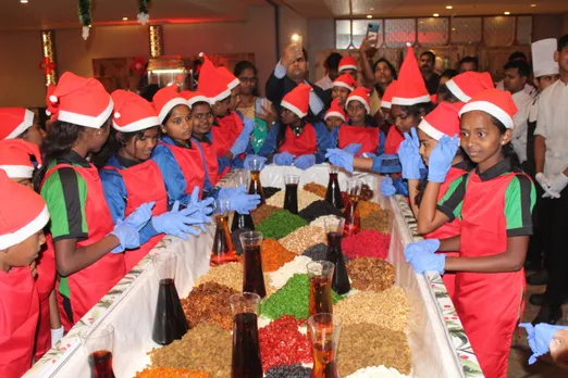 Courtyard By Marriott Bengaluru Hebbal and the Children of Living Hope celebrated This Children’s Day with a traditional Cake Mixing Ceremony