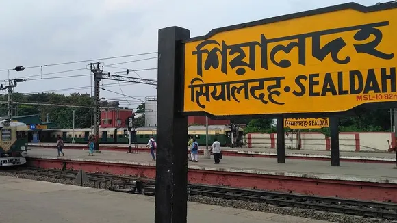 Know why railway stations have station names written in black on yellow colored boards, শিয়ালদহ