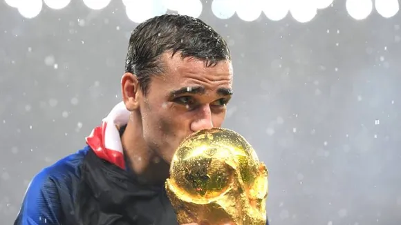 France kiss World Cup in Moscow rain