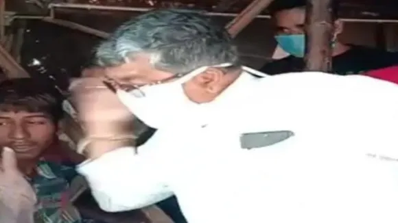 chinsurah mla trying to slaps a old man during his anti covid campaign