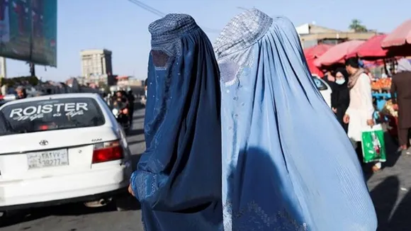 taliban announce women must cover faces and body by burqa