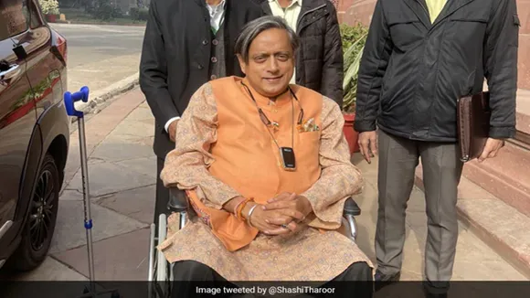Shashi Tharoor,Shashi Tharoor in wheelchair,Shashi Tharoor foot injury,Parliament,Shashi tharoor enters parliament building in a wheelchair,shashi tharoor news