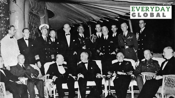 President Roosevelt & Prime Minister Churchill on the U.S.S. Augusta in a formal evening gathering.