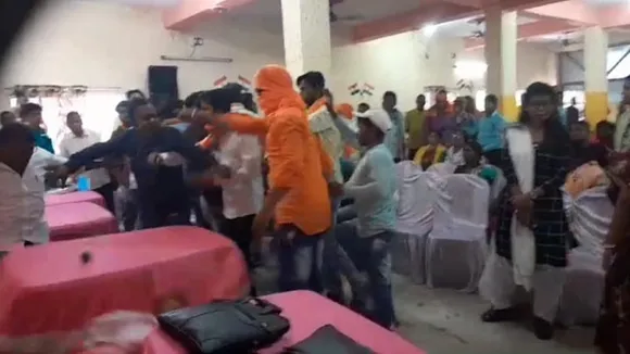 party workers fight with each other in front of BJP candidate SS Ahluwalia in Asansol