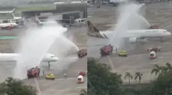 WATCH video T20 World Cup champion Team Indias flight receives special water cannon salute Mumbai Tamil News 