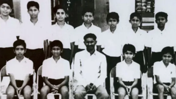 Do you know who the famous actor is in the school group photo