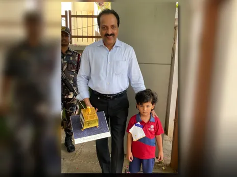 Young child gifts Vikram Lander model to ISRO Chairman S. Somnath
