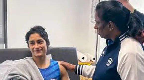 vinesh with pt usha