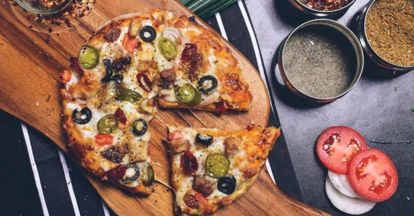 Craving some mouth-watering Pizzas? Here's where you can get the best Pizza delivery in Delhi