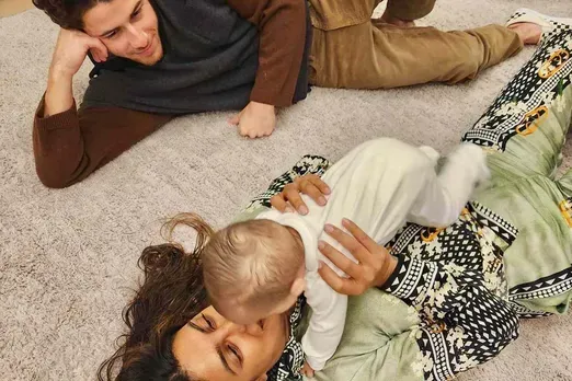Priyanka Chopra and Nick Jonas Play with Baby Malti in Sweet Family Photo