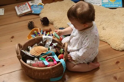 Loose Parts Play - Infant and Toddler Baskets and Ideas