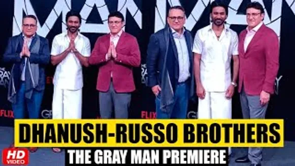 Dhanush Dons Traditional South Indian Lungi to pose with Russo Bros at 'The Gray Man' Premiere