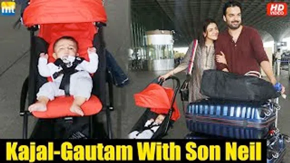 Kajal Aggarwal & Gautam Kitchlu take their son Neil on his first flight