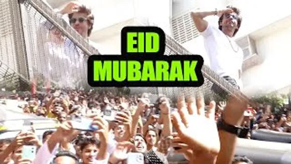 Pathaan Shah Rukh Khan & Lil Abram wave at fans at Mannat to Wish Eid Mubarak