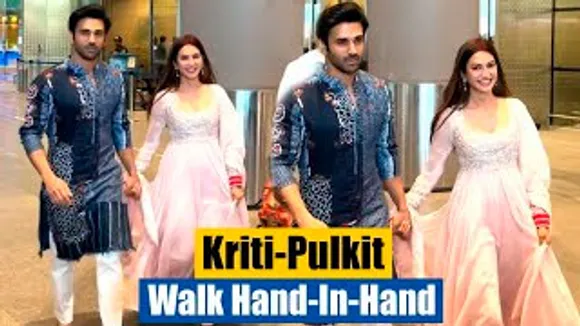 Newlyweds Pulkit Samrat & Kriti Kharbanda Walk Hand-In-Hand At Airport As They Arrive In Mumbai!