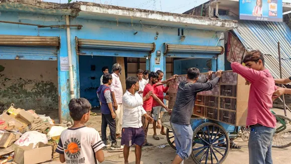 Locals vacate their shops after public works department (PWD) pasted notices on the properties, in violence-hit Maharajganj area of Bahraich, UP, Saturday, Oct 19, 2024.