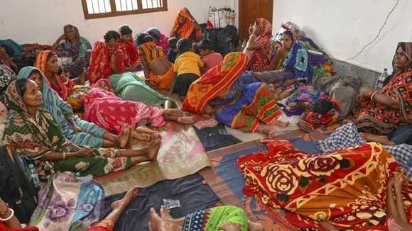 Evacuated villagers rest at a cyclone shelter ahead of the cyclone 'Dana' landfall, in Bhadrak district, Thursday, Oct. 24, 2024