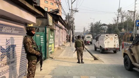 Security personnel stand guard during a cordon and search operation after reports of movement of terrorists in the Khanyar area, in Srinagar, Saturday, Nov. 2, 2024.