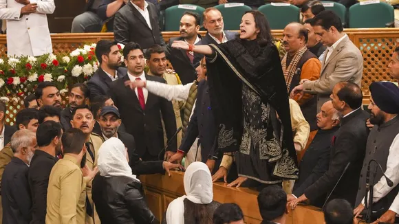 Opposition legislators during their protest over the special status resolution in the Jammu and Kashmir Assembly, in Srinagar, Thursday, November 7, 2024.
